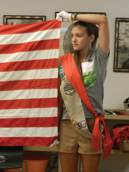 Rodriguez in Savannah, Georgia, participating in a traditional flag ceremony where she and her troop honored the 100-year anniversary of the Girl Scouts. 