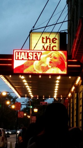Fans see images of Halsey being displayed across marquee of the Vic Theatre, where Halsey is about to perform in 10 minutes.