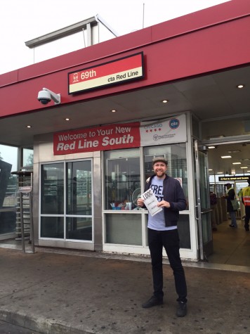 Mr.Wilcox showcasing LDOC publication in front of 69th redline station.