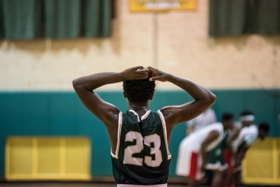DYontae Luster pauses for a breath during important free throws. 