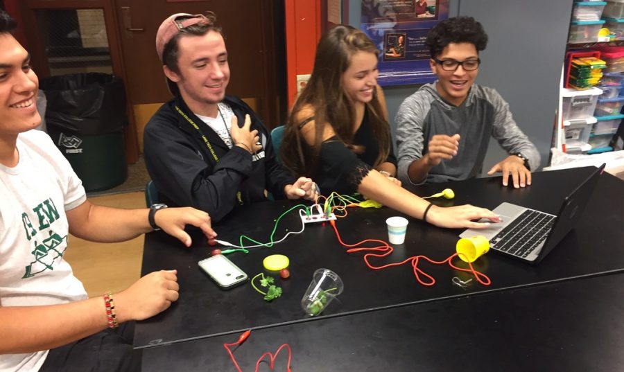 Armand Vargas, left, Vince Costello, Octavia Marie, and Jason Rivera are shown working collaboratively on the
Makey Makey song challenge.