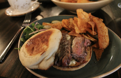 Band of Bohemias steak sandwich; local grass-fed beef and béarnaise sauce on a sourdough muffin.