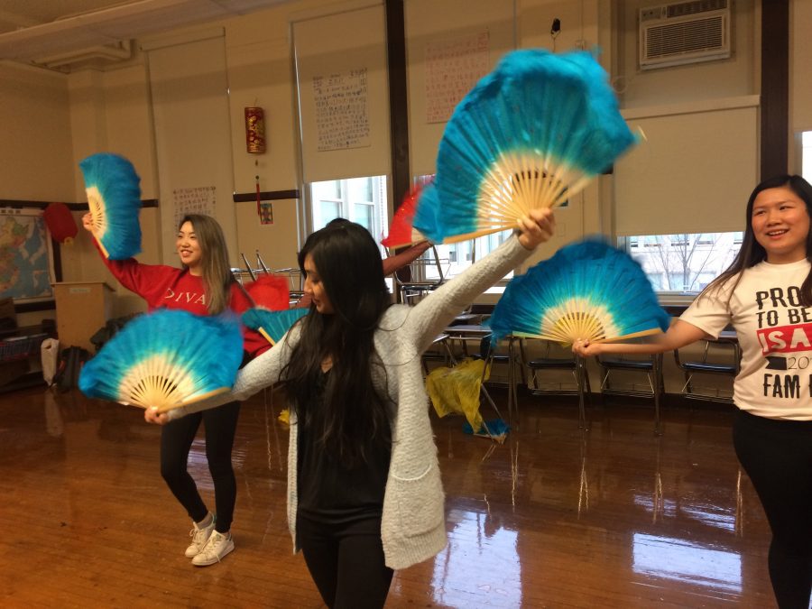 Chinese club members Lilly Nguyen, Div. 770, and Mei Ochs, Div. 758, practice their I-Days routine. 