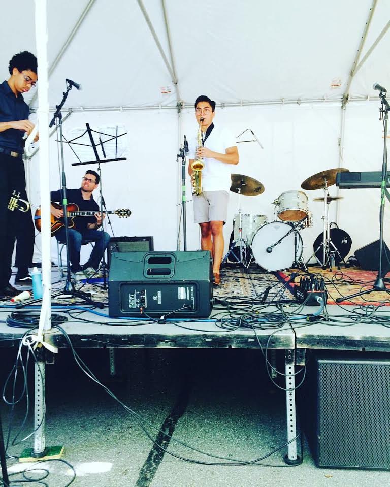 Rojas+plays+saxophone+at+the+2016+Bucktown+Music+and+Arts+fest+%28Photo+courtesy+of+Michael+Rojas%29