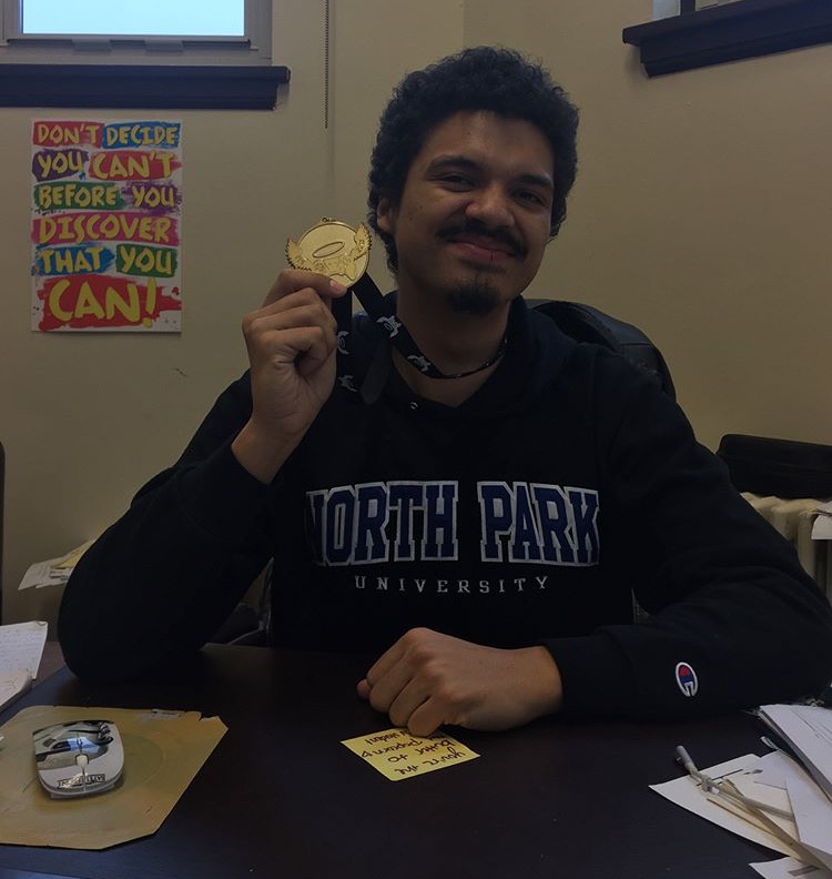 Payano received a medal after fundraising with Extra Life movement.