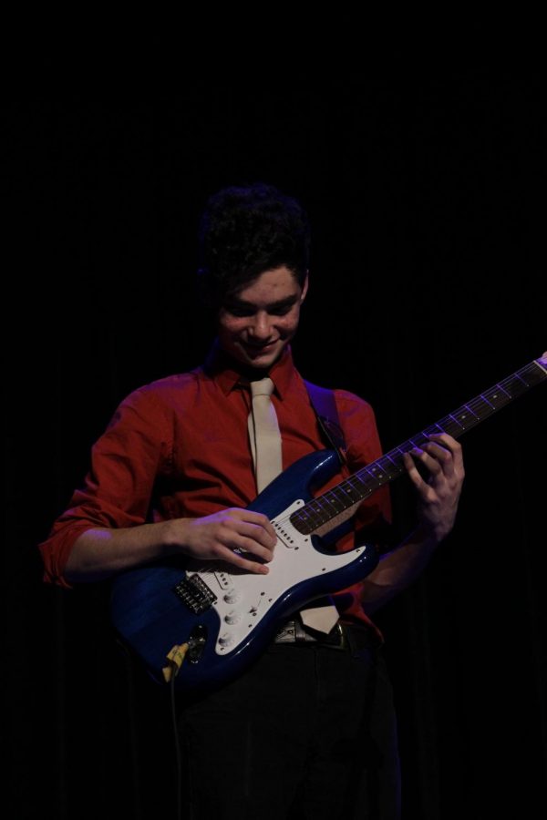 Jared May, Div. 860, performs a cover of the song “Everybody Wants Somebody” with his band Theta Days at this years Unplugged concert.

(Photo courtesy of Jacqueline Pacheco)
