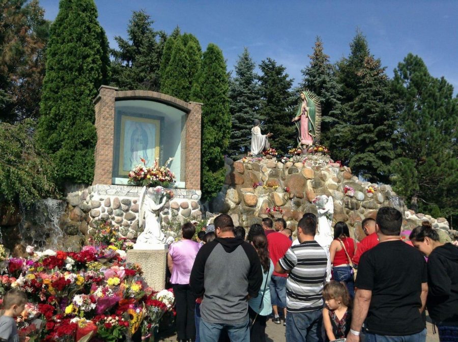 People gather around a shrine of La Virgen de Guadalupe to honor the Virgin Mary, at el Cerrito del Tepeyac, in Des Plaines, in late August. (Photo courtesy of William Garcia)