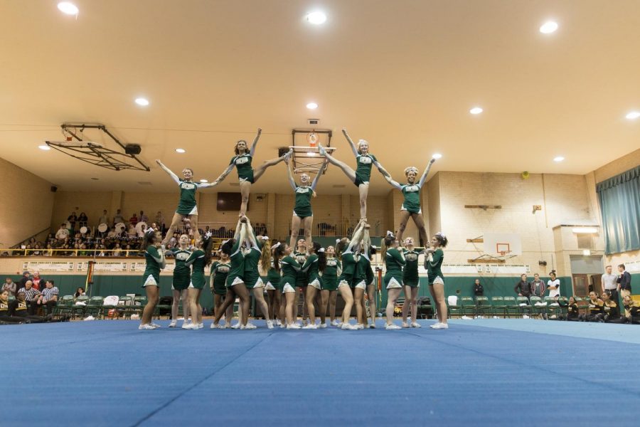 The cheer team performed at the Green and Gold game on Nov. 17.
