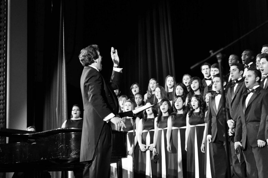 Mark Carrera, one of Lanes two choir conductors, leads concert choir in a past winter concert. (Photo courtesy of Lane Tech Choir Department)