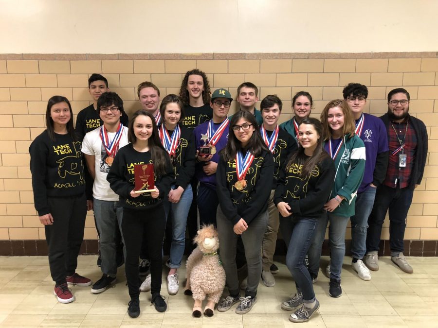 The Academic Decathlon team poses with their medals and mascot, Al the Alpaca. (Photo courtesy of Mr. Campos)