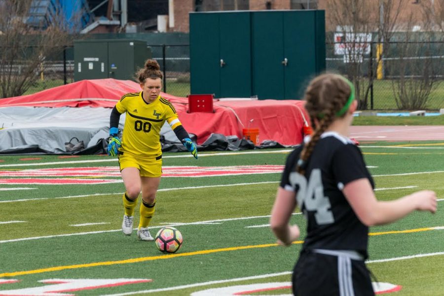 Captain Maggie Grossman clearing the ball in a 2-0 win at Niles West High School last year on March 24 of the 2017 season. They will face Niles again on April 27. (Photo courtesy of Wendy Love)