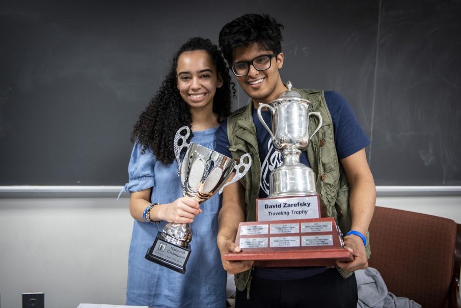 Ariana Collazo and Ousaf Moqeet holding the championship trophy. The pair had been debating for over three hours on April 22. The Urban Debate National Championship was held April 20-22 at George Washington University, where Collazo and Moqeet debated long hours from 8 a.m. to 10 p.m. (Photos courtesy of Chicago Debate League)