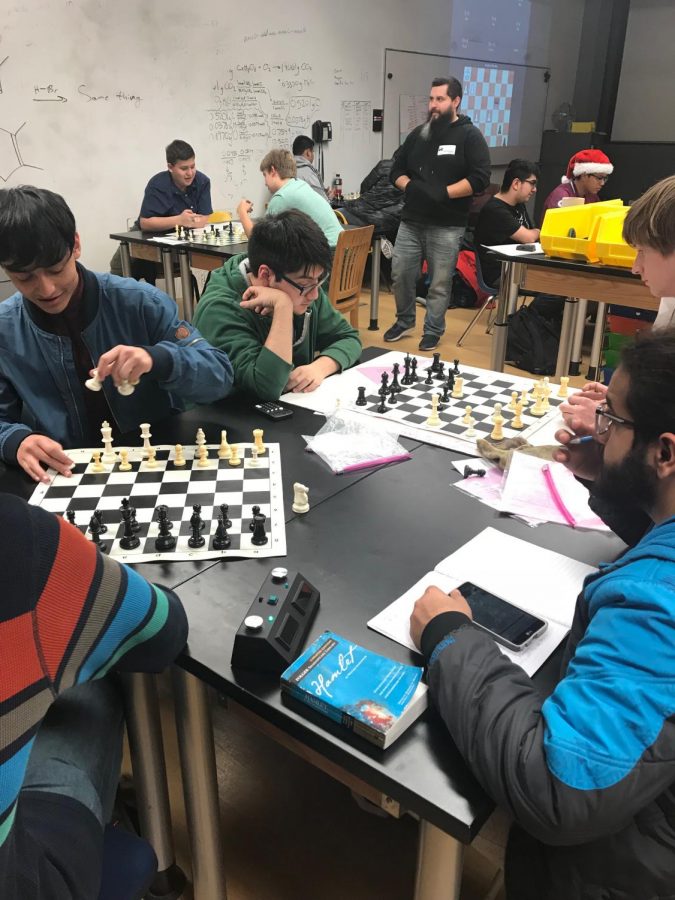 Members of Chess Club play games against each other during practice. Members practice new strategies they have learned from their coach, Kevin Velazquez, who gives lessons every Tuesday.
