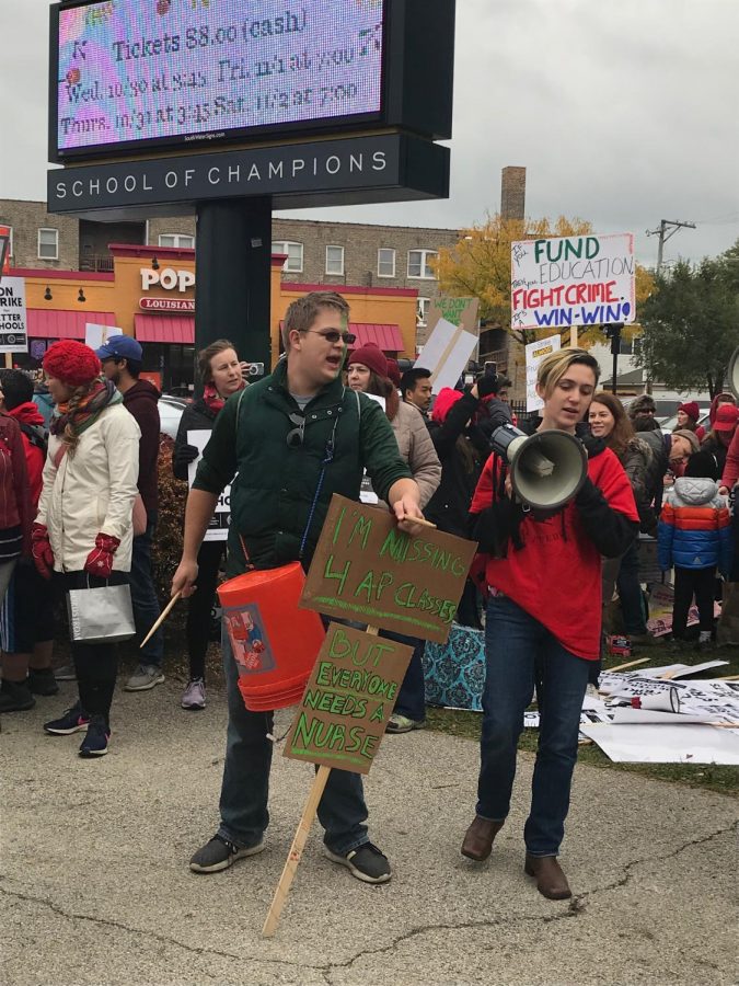 Lane+students+gathered+at+Western+and+Addison+on+Oct.+25+to+show+support+for+the+CTU+and+SEIU+strike.+Students+brought+signs%2C+led+chants+and+played+on+drums+as+they+walked+the+picket+line.