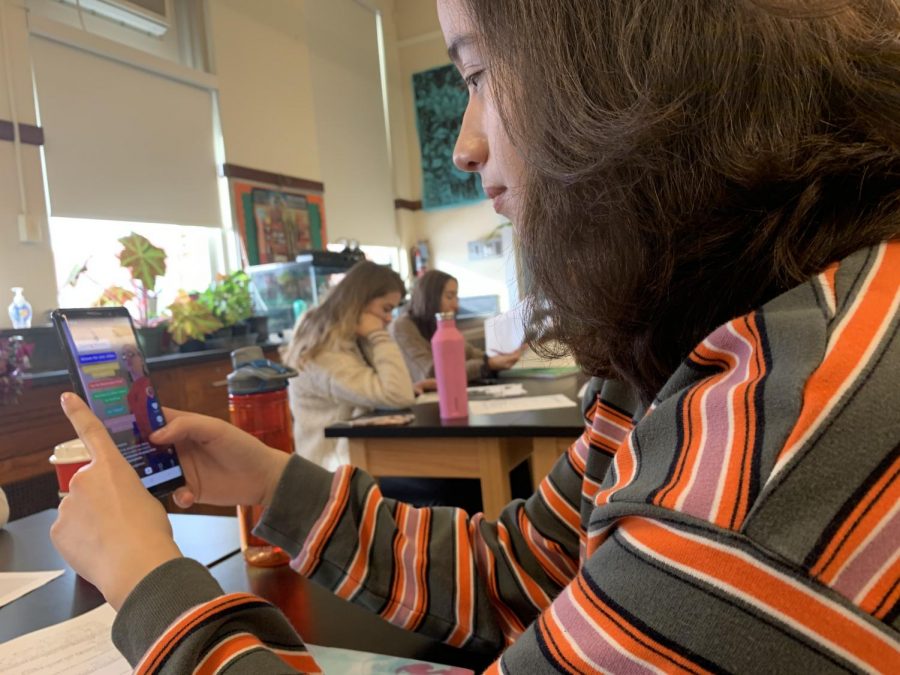 A Lane student enjoys watching Tik Tok during some downtime in class. Students choose Tik Tok over other apps