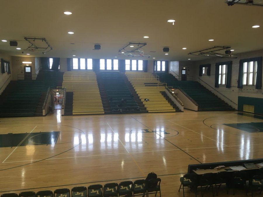 Lane+Gymnasium+sits+empty+before+a+basketball+game+in+February.+Athletes+now+await+a+return+to+play.