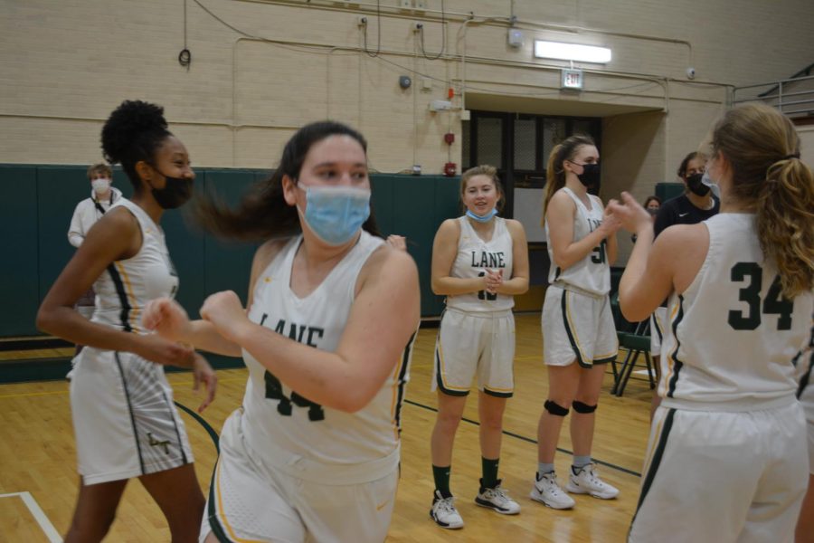 Lane’s Caroline Meyers during player introductions on Dec. 7 versus the Payton Grizzlies.