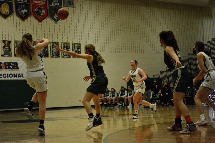 Yorks Mariann Blass (1) passes to Hannah Meyers (20) with Lanes Lauren Collins (10) trying to intercept. 
