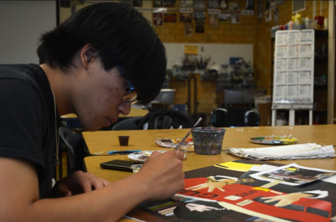 Jonathan Phan works on an art project in Sarah Wain’s class during advisory on June 9. Next year, students will have two advisories per month to go to office hours or do work for a class.