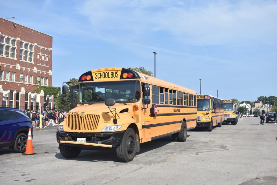  CPS buses waiting in the parking lot, a few minutes after school lets out. 