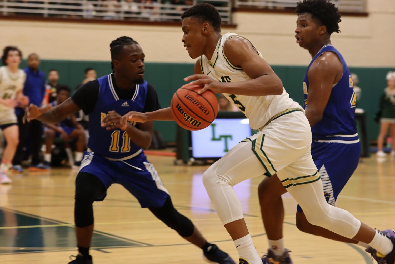 PHOTO GALLERY: Boys Basketball drops conference opener in heartbreaking ...