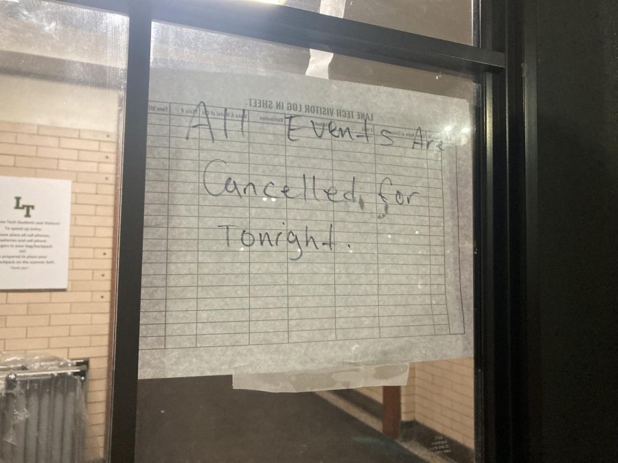 A sign posted on Door M Thursday night.