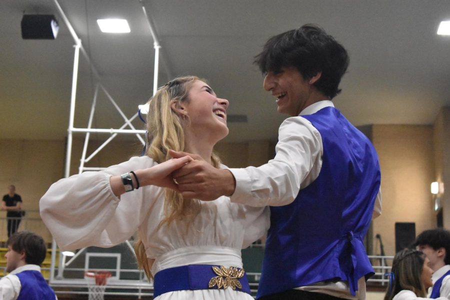 Seniors Maddie Gavaldon and Guiliano DiFranco dance together during Israeli Club’s performance.