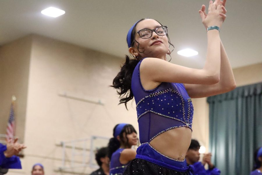 Senior Andrea Palomino dances during the Cuban Club’s performance.