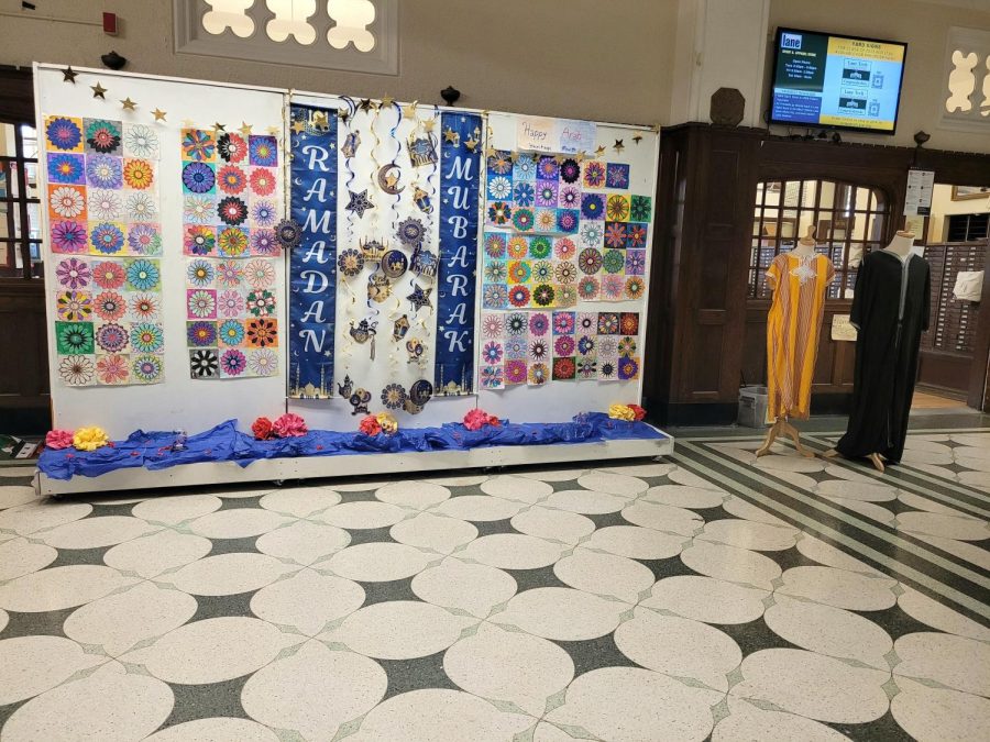 Decoration board outside the main office displaying zellige patterns made by students, Ramadan decoration by Lane’s Muslim Club and Arab clothing brought by Mohamed Danja. (Photo courtesy of Gabriela Escobar)