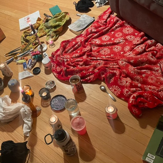 Sadie La Prairie works on sketching in her living room. She sits on a blanket and surrounds herself with her painting supplies, sketchbooks and past works, often for hours at a time.
Photo courtesy of Sadie La Prairie.