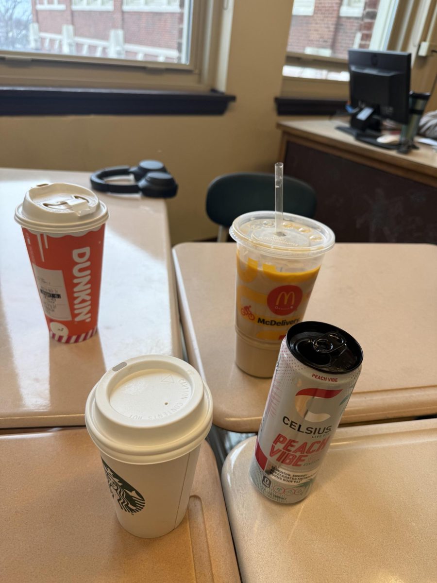 Four different brands of caffeinated beverages at the same table the morning after finals.