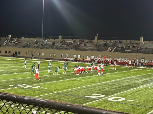 Lane faces off against TF South at the line of scrimmage.