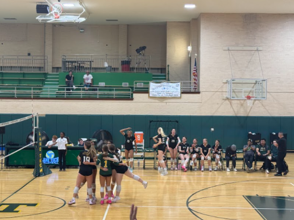 Lane Champions come together to celebrate a win against Agricultural Science Cyclones. Lane bounced back from a 3-7 record so far this season after struggling with roster challenges