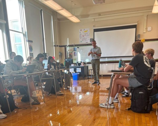Mr. Bradish leads a discussion with athletes during Letterman Club sports advisory on Sept. 17.